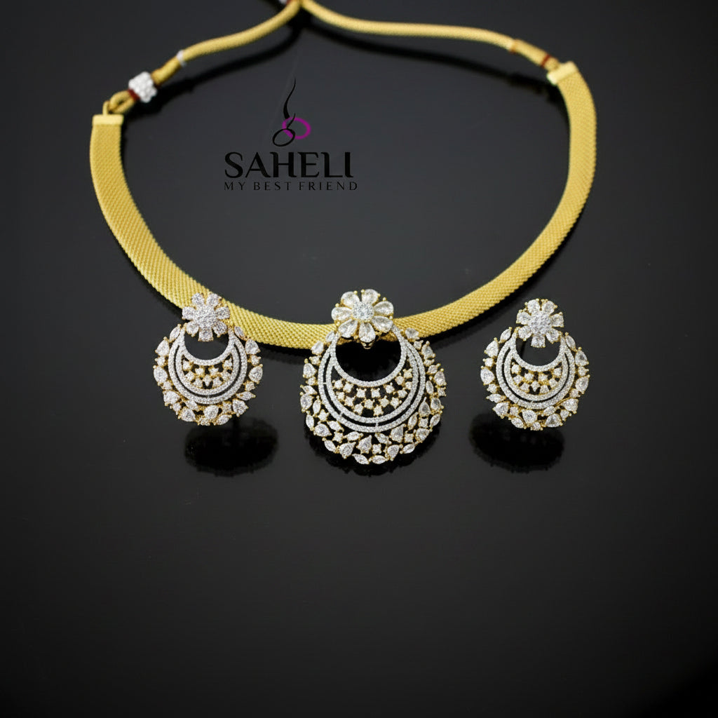 Gold necklace and earrings set with 'SAHELI' branding on a dark background
