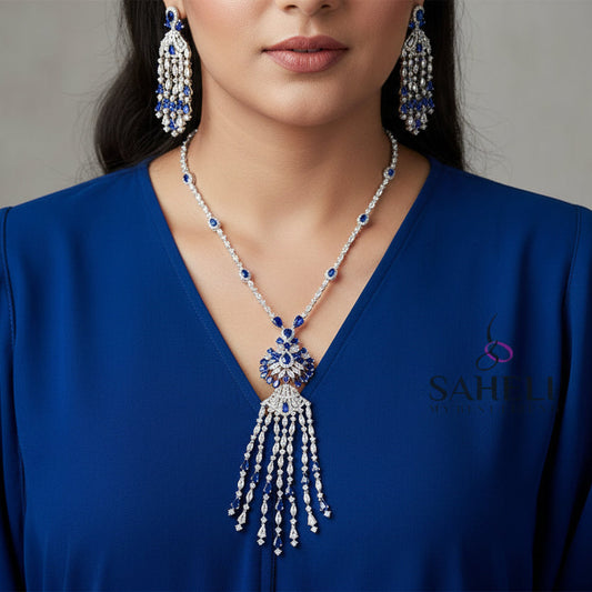 Silver and blue jewelry set with 'SAHeli' branding on a dark background