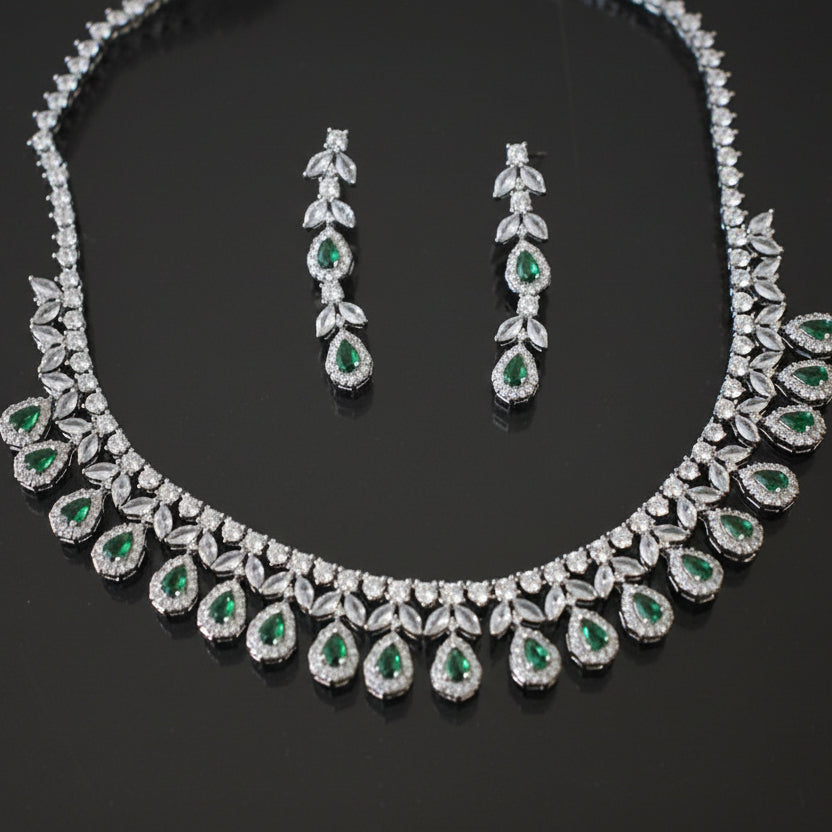 Jewelry set with necklace and earrings on a black background