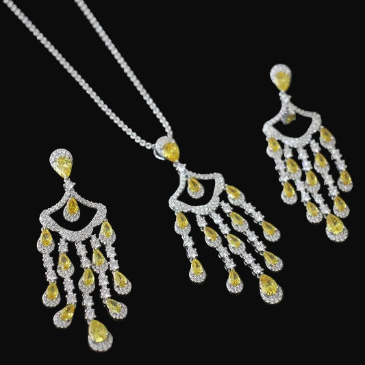 Jewelry set with chandelier earrings and necklace on a black background